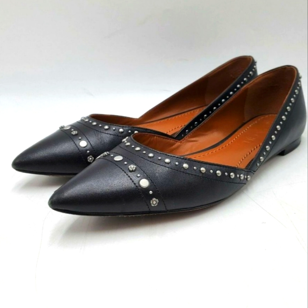 Coach Valentina pointed toe flats with flower stud details.